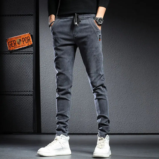 Autumn winter 2022 elastic waist thicken fleece jeans for men Slim fit small feet Korean fashion casual pants for men Long pants